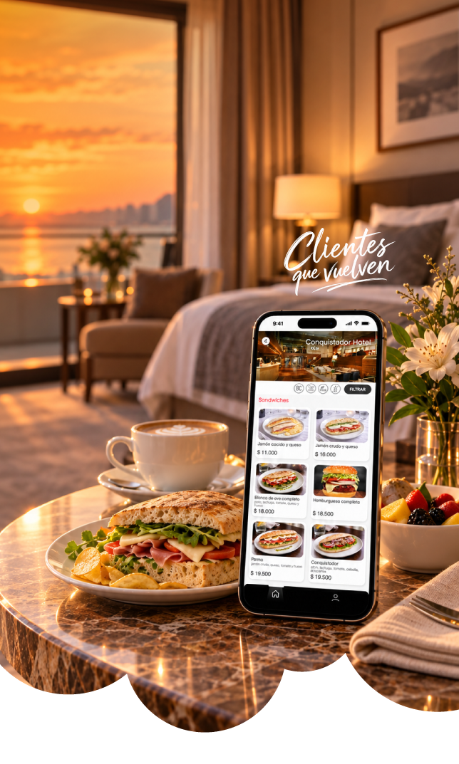 Room service en una terraza de hotel: café, sándwich y el menú en el celular al atardecer.